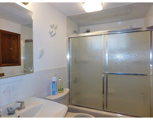 105 Hillcrest Road Waltham, MA 02451 - Photo 16 of 20 a bathroom with a bathtub and a sink