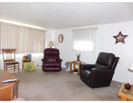 105 Hillcrest Road Waltham, MA 02451 - Photo 8 of 20 a living room with furniture and a window