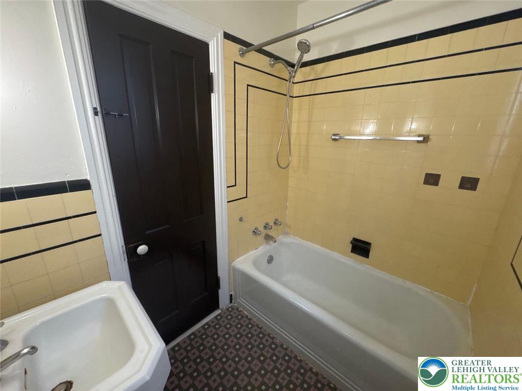 636 North New Street, Unit 3 Bethlehem, PA 18018 - Photo 10 of 10 a bathroom with a bathtub and a shower