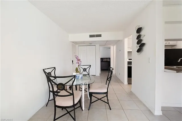 a view of a livingroom with furniture and a flat screen tv