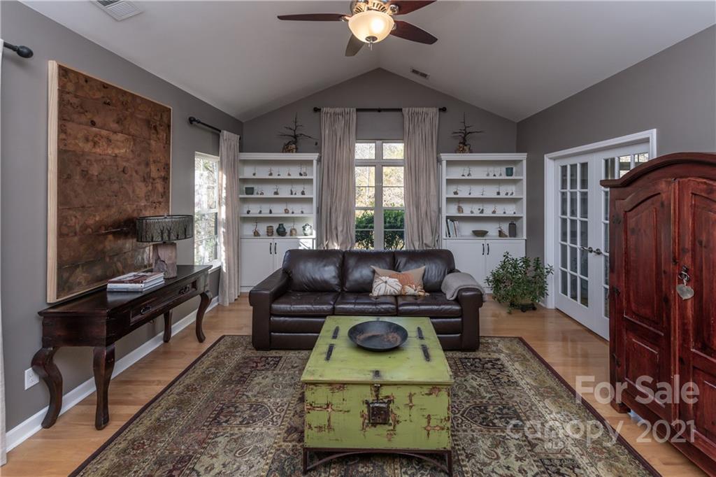 4825 Polo Gate Boulevard Charlotte, NC 28216 - Photo 14 of 30 a living room with furniture and a window
