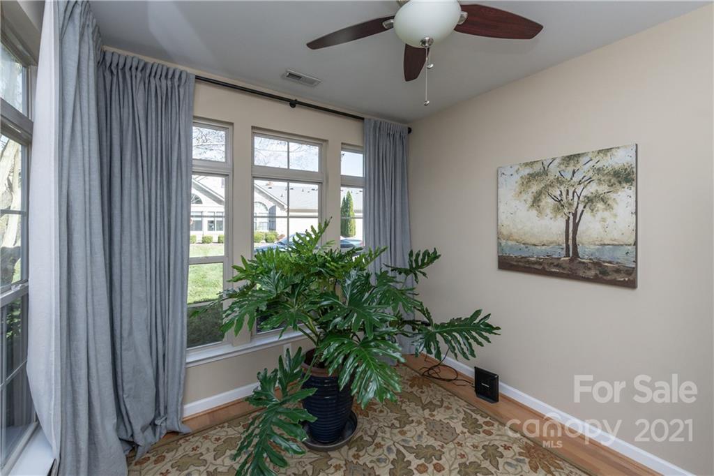 4825 Polo Gate Boulevard Charlotte, NC 28216 - Photo 26 of 30 a view of a livingroom with a potted plant and furniture