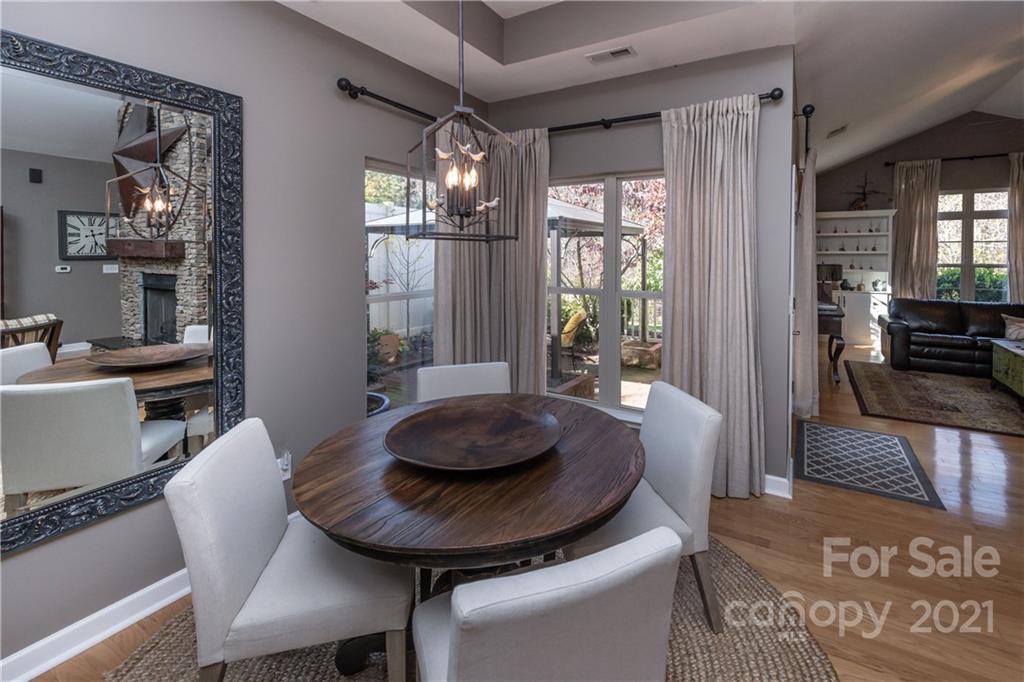 4825 Polo Gate Boulevard Charlotte, NC 28216 - Photo 9 of 30 a living room with furniture and a large window