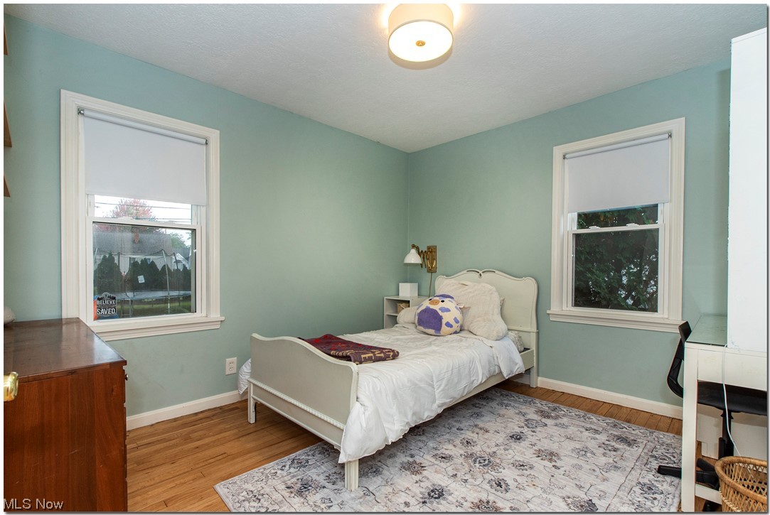 1430 West Miner Road Cleveland, OH 44124 - Photo 17 of 32 Second 1st floor Bedroom featuring light hardwood flooring