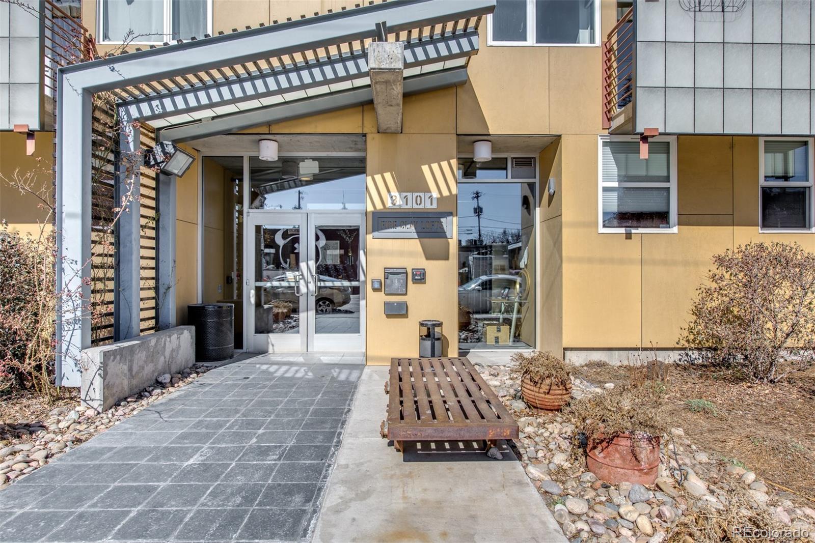 a front view of a building with glass windows