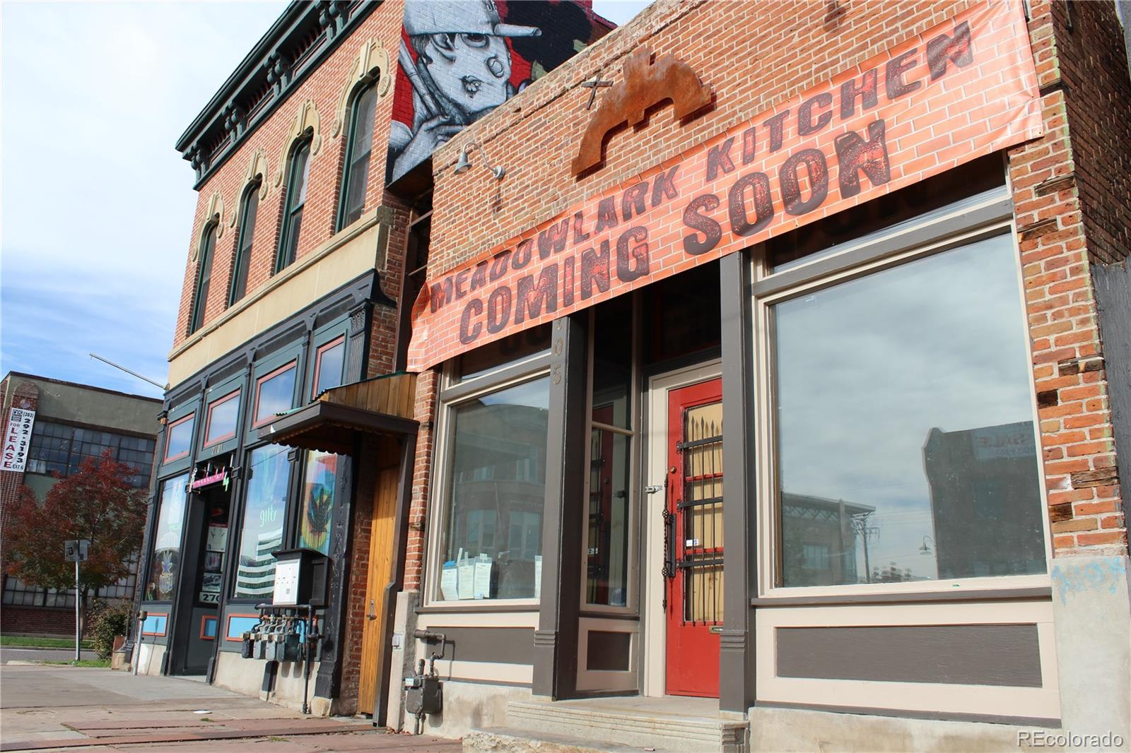 3101 Blake Street, Unit 308 Denver, CO 80205 - Photo 24 of 30 a view of a building on a street