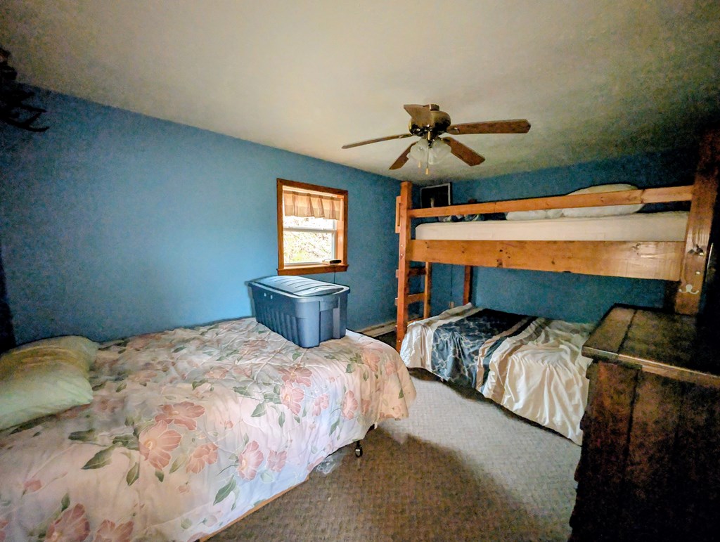 2009 Economite Road East Tidioute, PA 16351 - Photo 8 of 16 a bedroom with two beds and ceiling fan