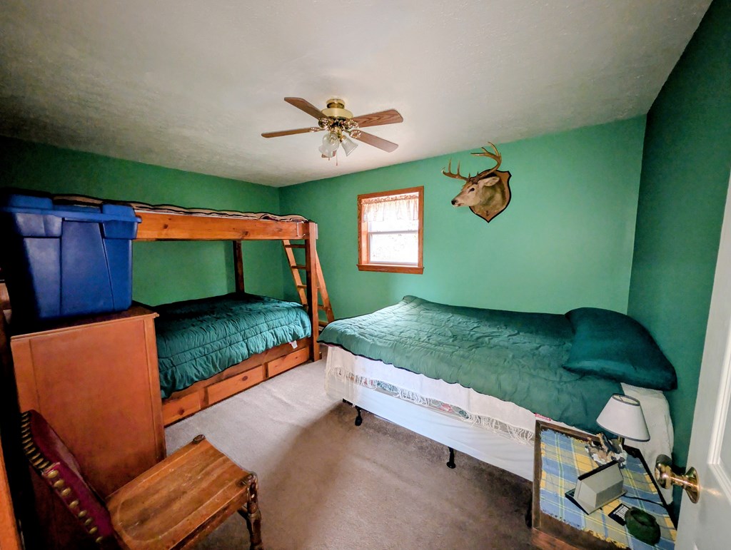 2009 Economite Road East Tidioute, PA 16351 - Photo 9 of 16 a bed room with a bed and a chair