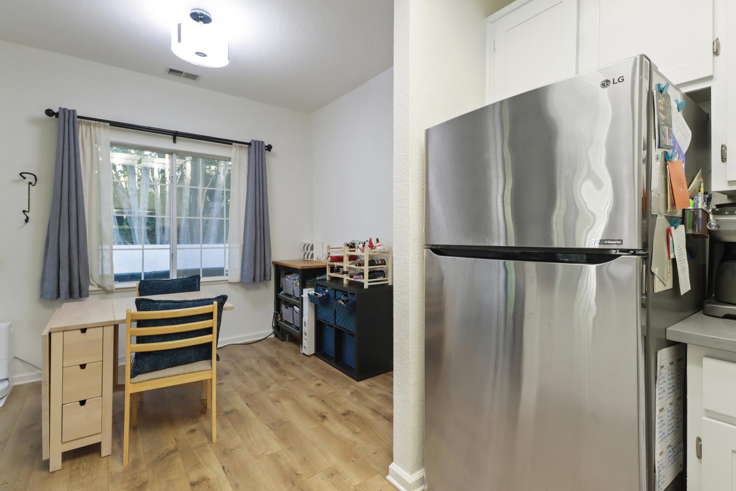 1175 Greene Terrace Davis, CA 95618 - Photo 21 of 35 a kitchen with stainless steel appliances granite countertop a refrigerator and a sink