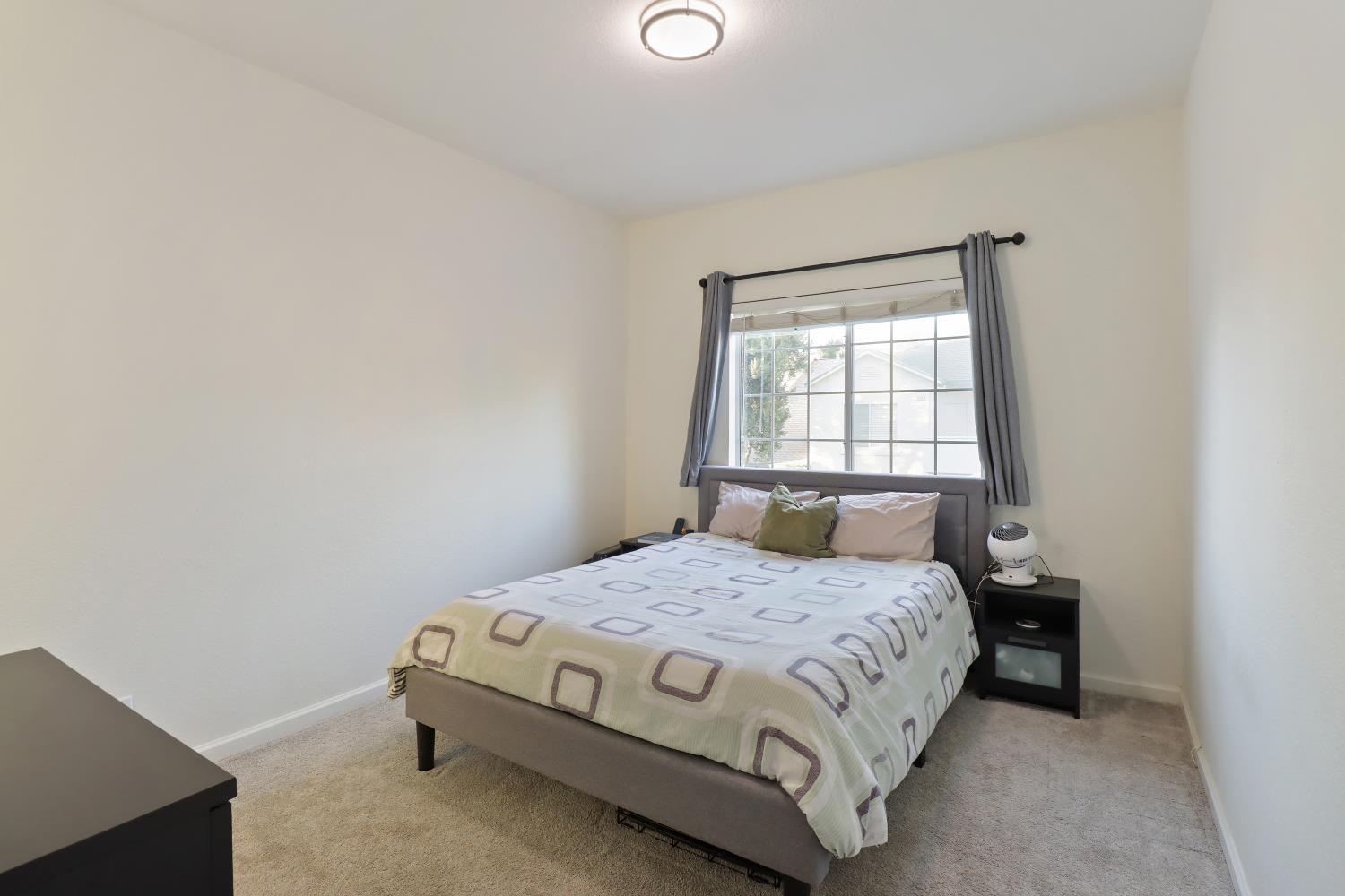 1175 Greene Terrace Davis, CA 95618 - Photo 23 of 35 a bedroom with a bed and window