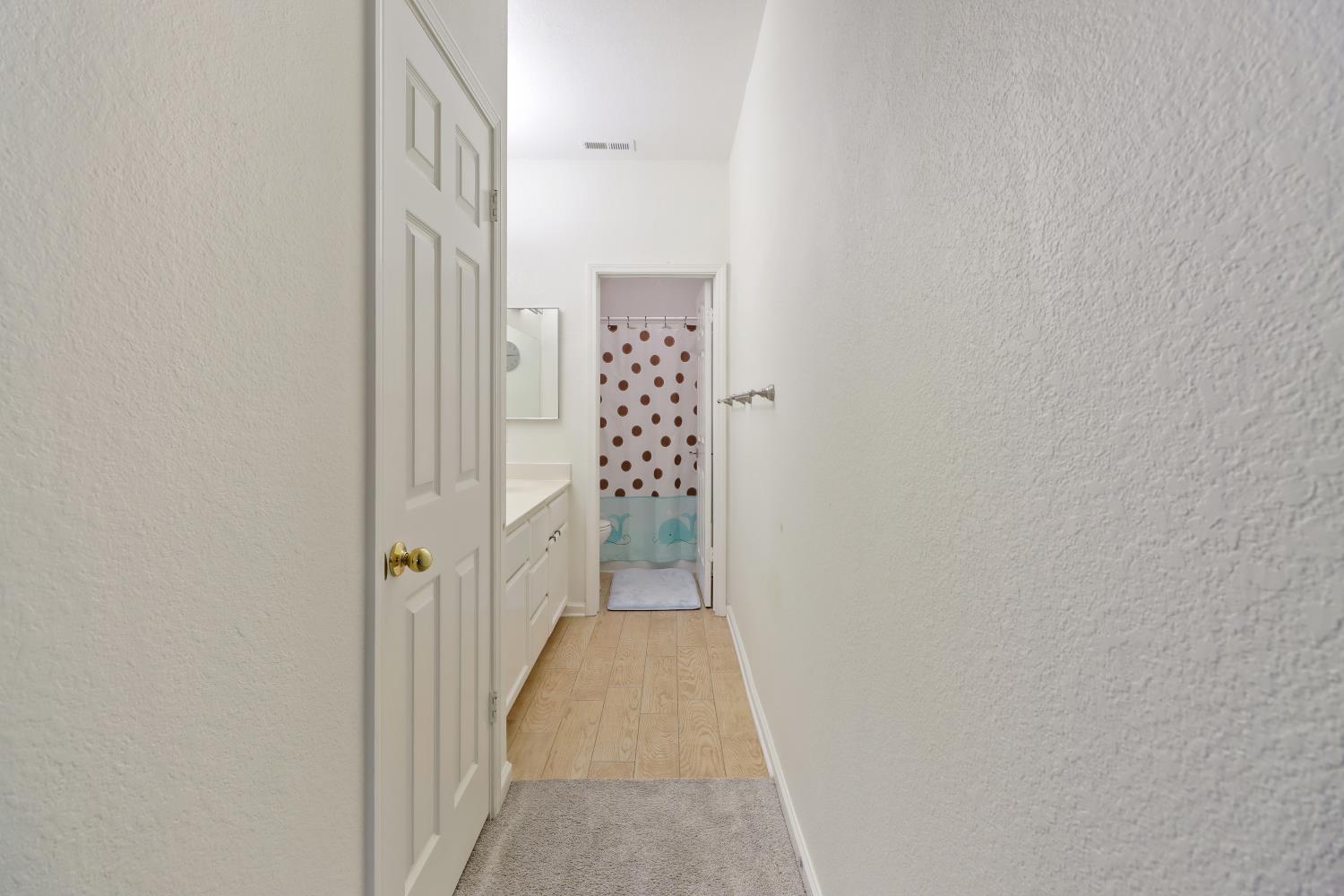 1175 Greene Terrace Davis, CA 95618 - Photo 25 of 35 a view of a hallway with wooden floor and closet