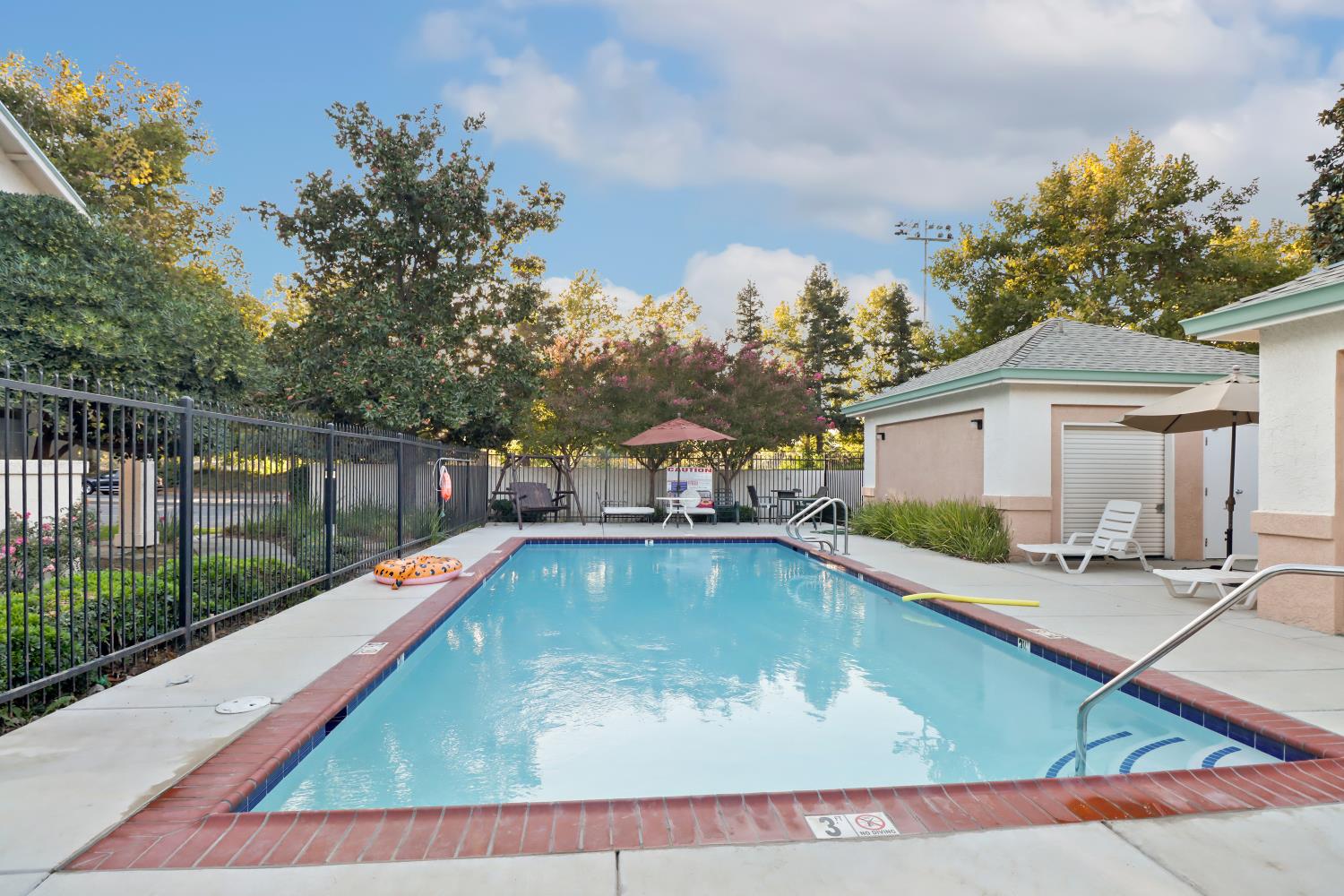 1175 Greene Terrace Davis, CA 95618 - Photo 35 of 35 a view of a house with pool yard and sitting area