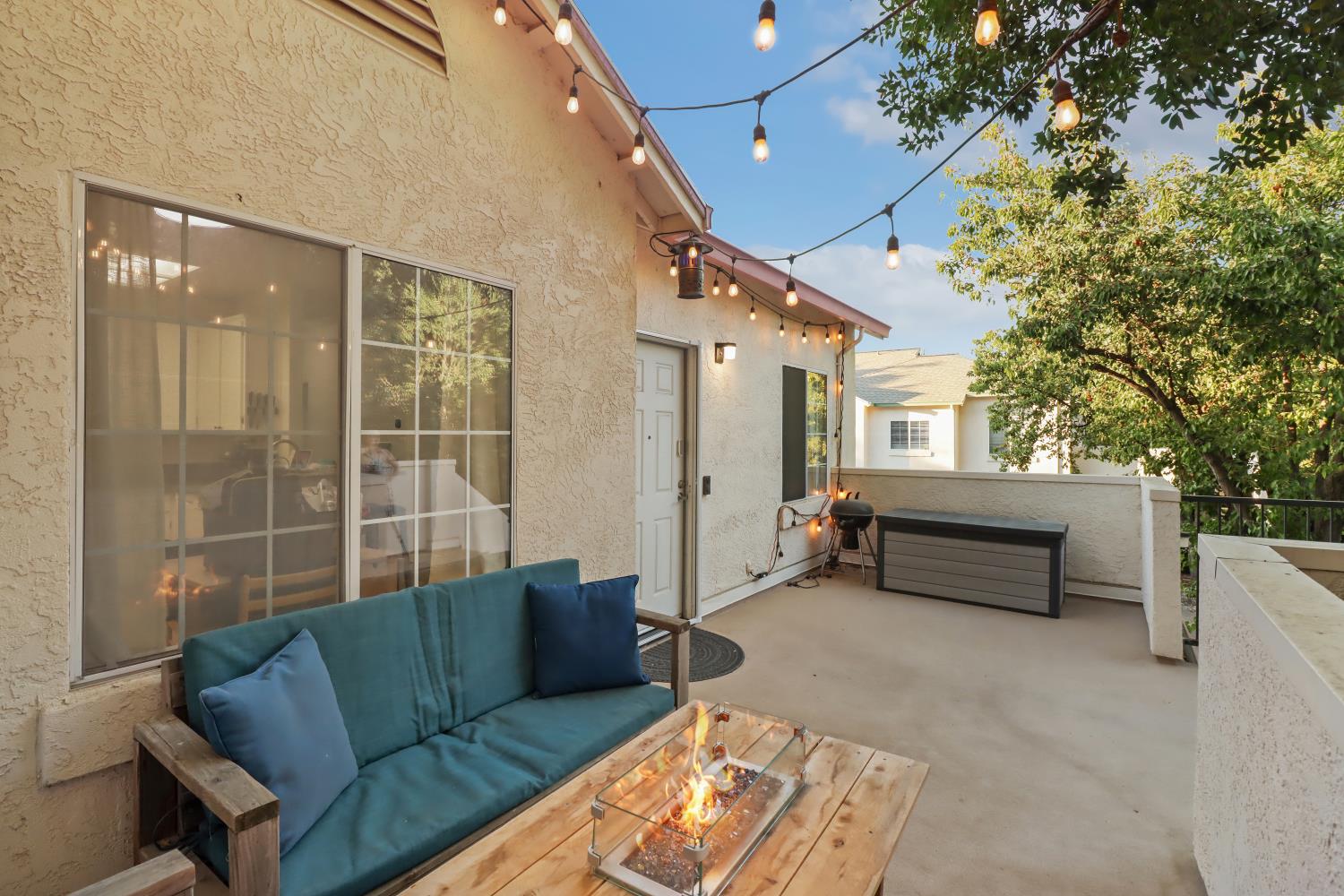 1175 Greene Terrace Davis, CA 95618 - Photo 7 of 35 a balcony with furniture and a potted plant
