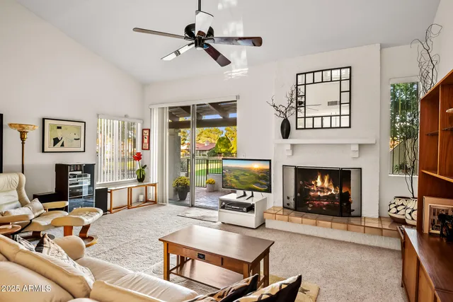 a spacious bathroom with a granite countertop sink and a mirror