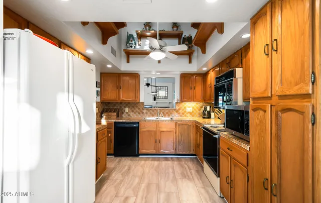 a view of a house with a big yard