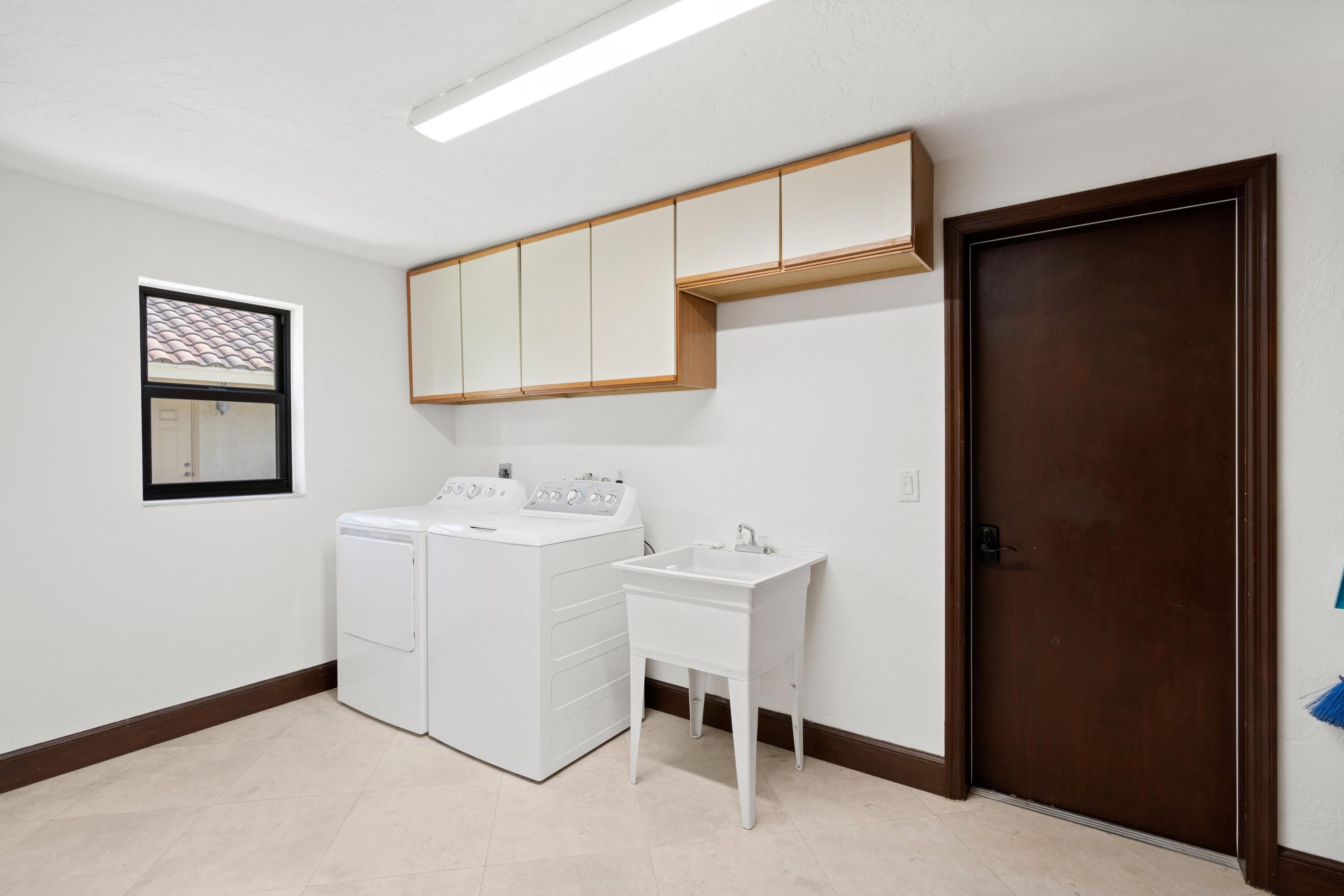 293 Northwest 64th Street Boca Raton, FL 33487 - Photo 25 of 39 Laundry Room