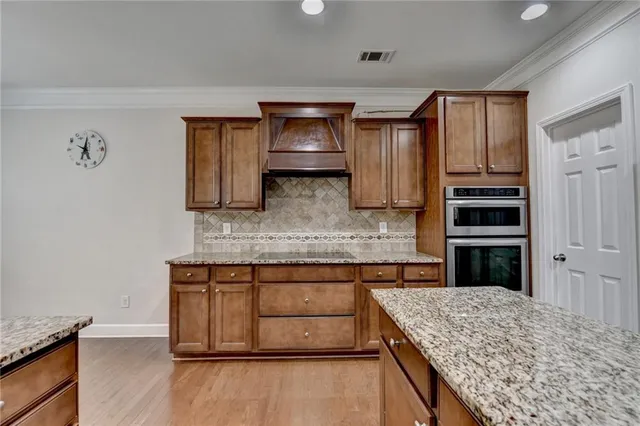 a room with gym equipment and a window