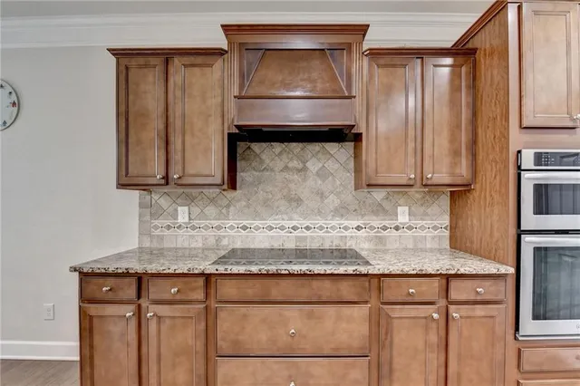 a living room with furniture fireplace and flat screen tv