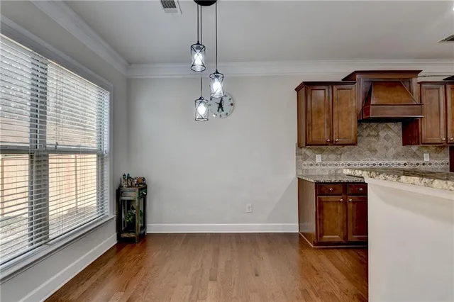 a en suite bathroom with a sink and a mirror