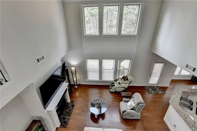 a bathroom with a shower a toilet and a sink