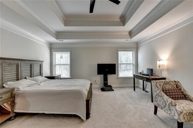 a sign that is sitting on a brick wall