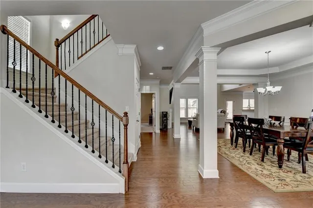 a living room with fireplace furniture and a flat screen tv