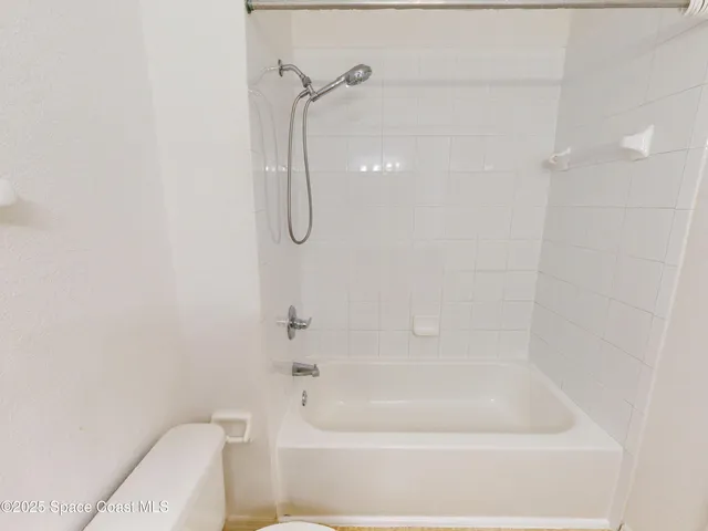 a close up of a bathtub in a bathroom