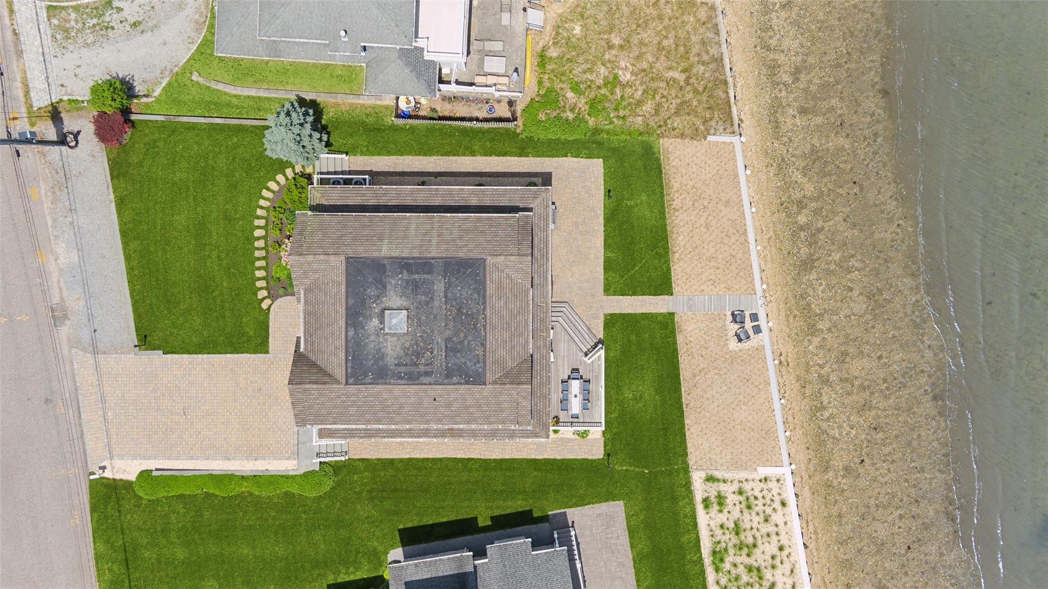 9 Shinnecock Road East Quogue, NY 11942 - Photo 28 of 34 a view of front door of house