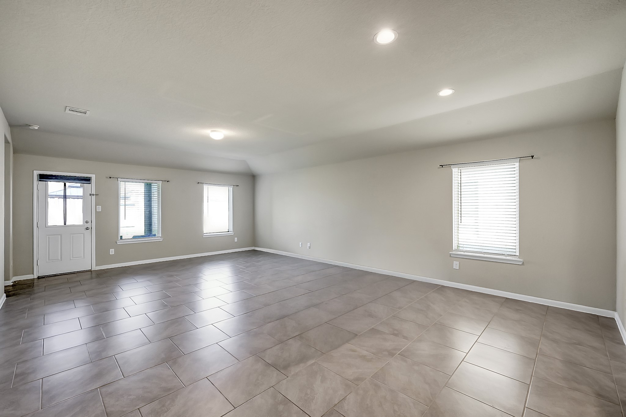 3310 Scout Island Katy, TX 77494 - Photo 16 of 42 an empty room with large windows