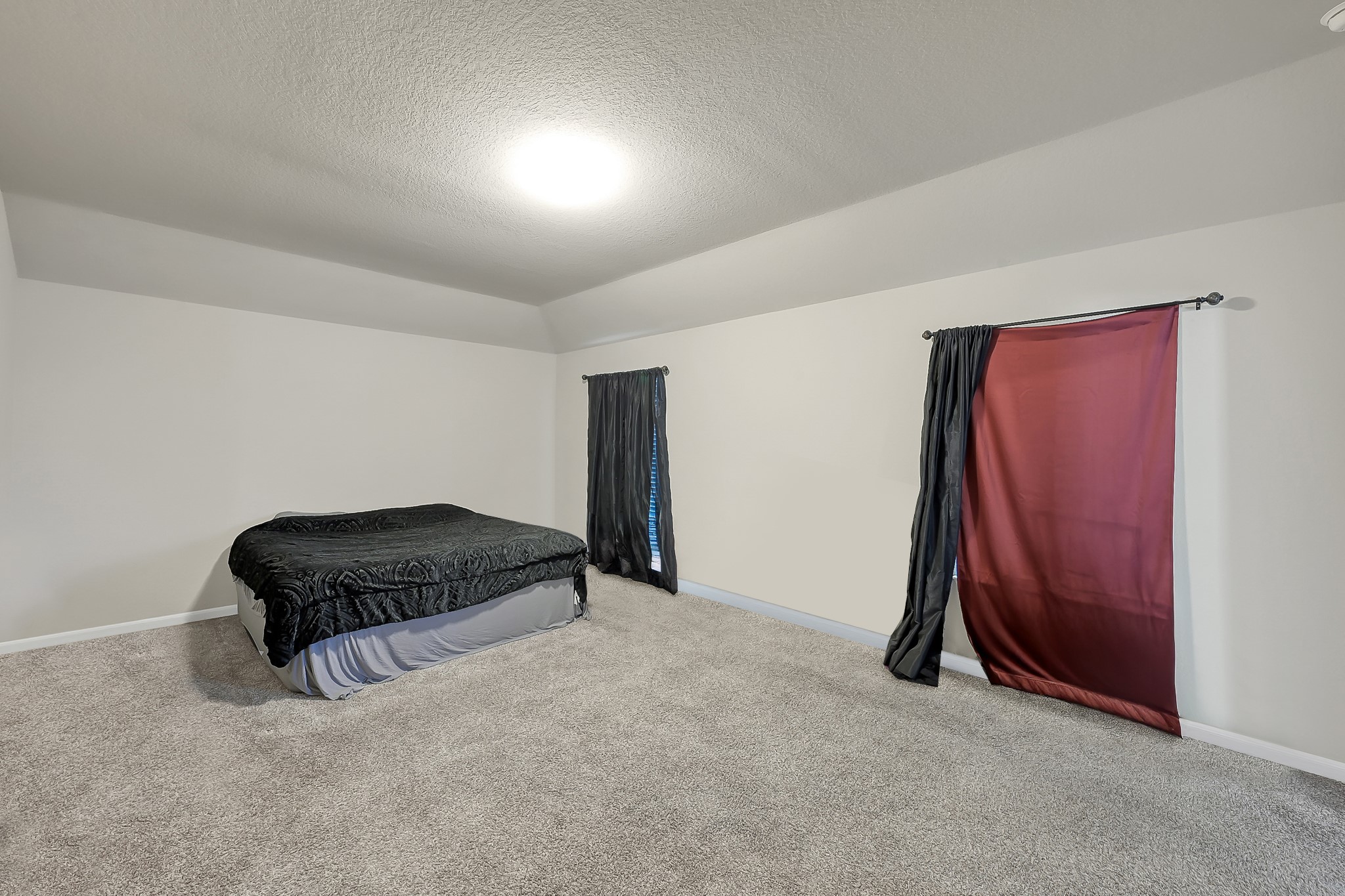 3310 Scout Island Katy, TX 77494 - Photo 18 of 42 an empty room with a ceiling fan