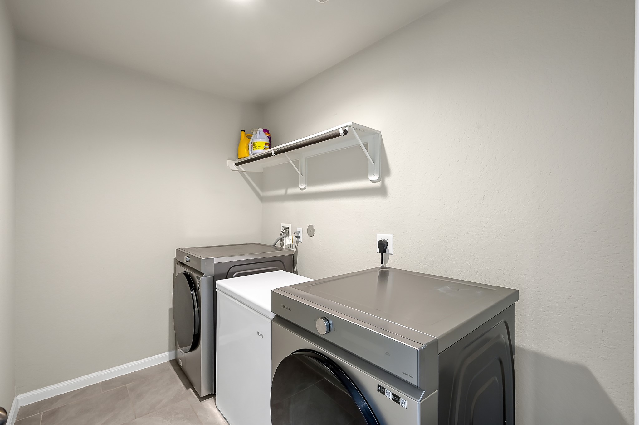 3310 Scout Island Katy, TX 77494 - Photo 23 of 42 a utility room with dryer and washer