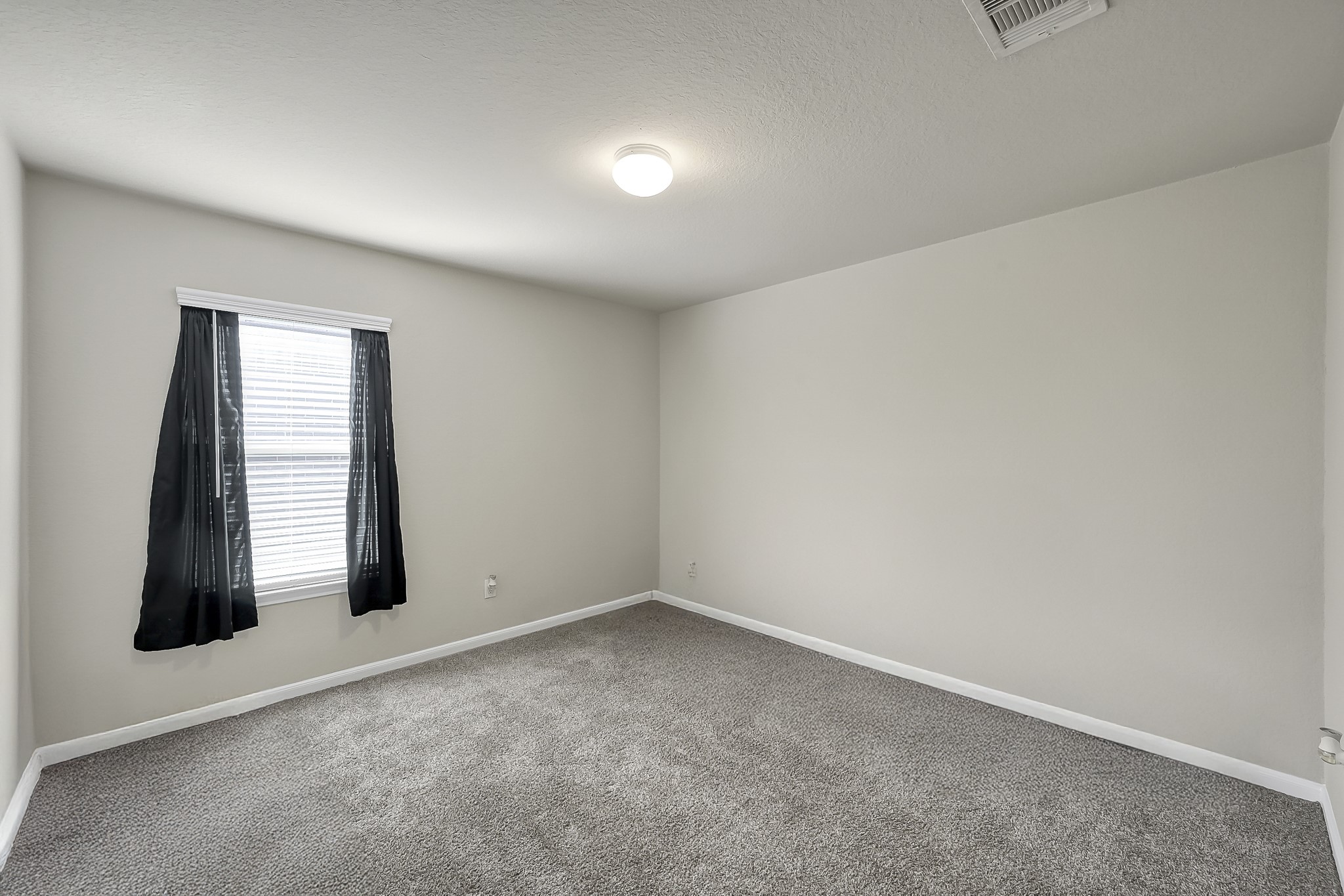 3310 Scout Island Katy, TX 77494 - Photo 26 of 42 an empty room with windows