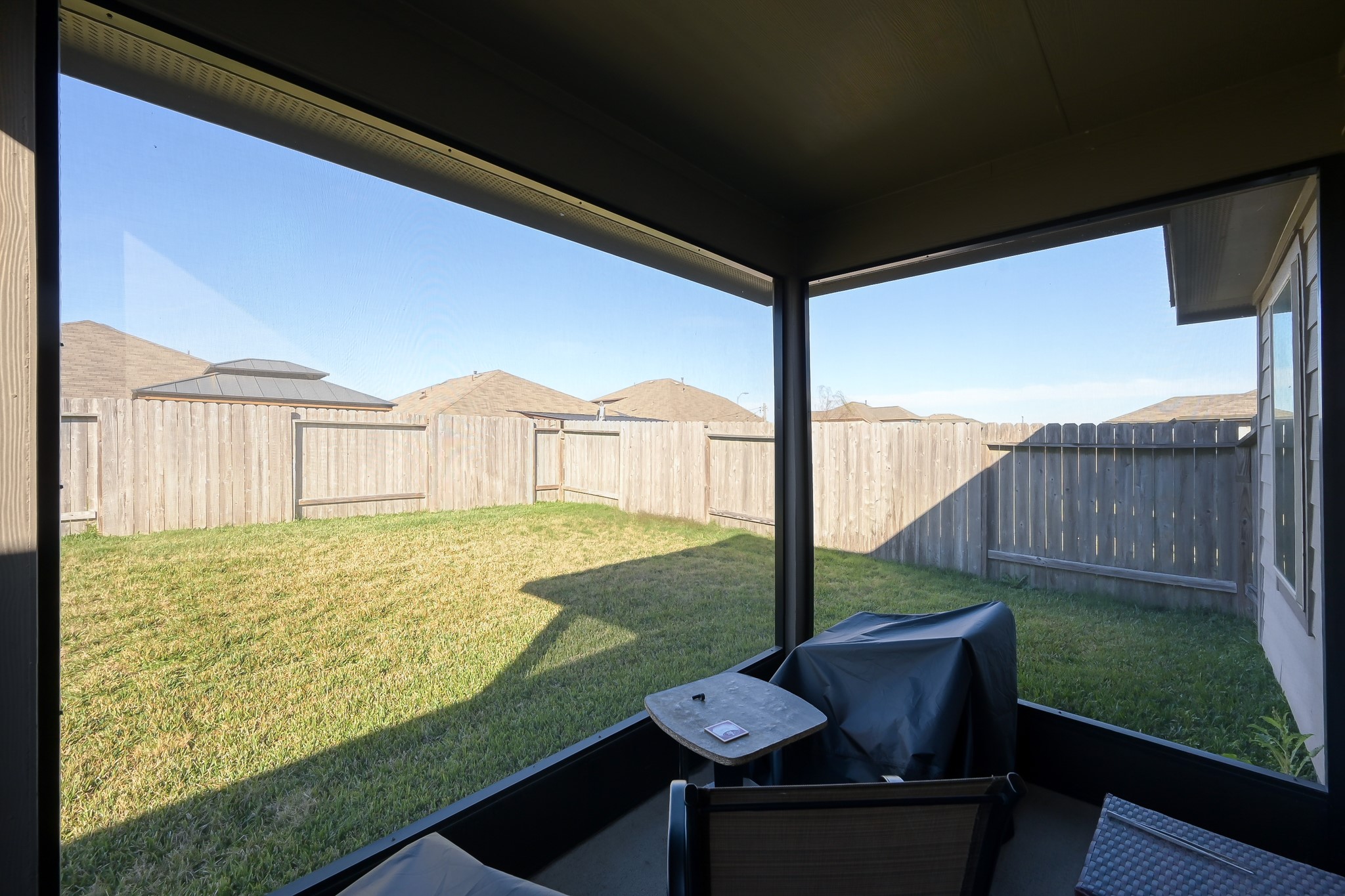 3310 Scout Island Katy, TX 77494 - Photo 34 of 42 a backyard of a house with table and chairs