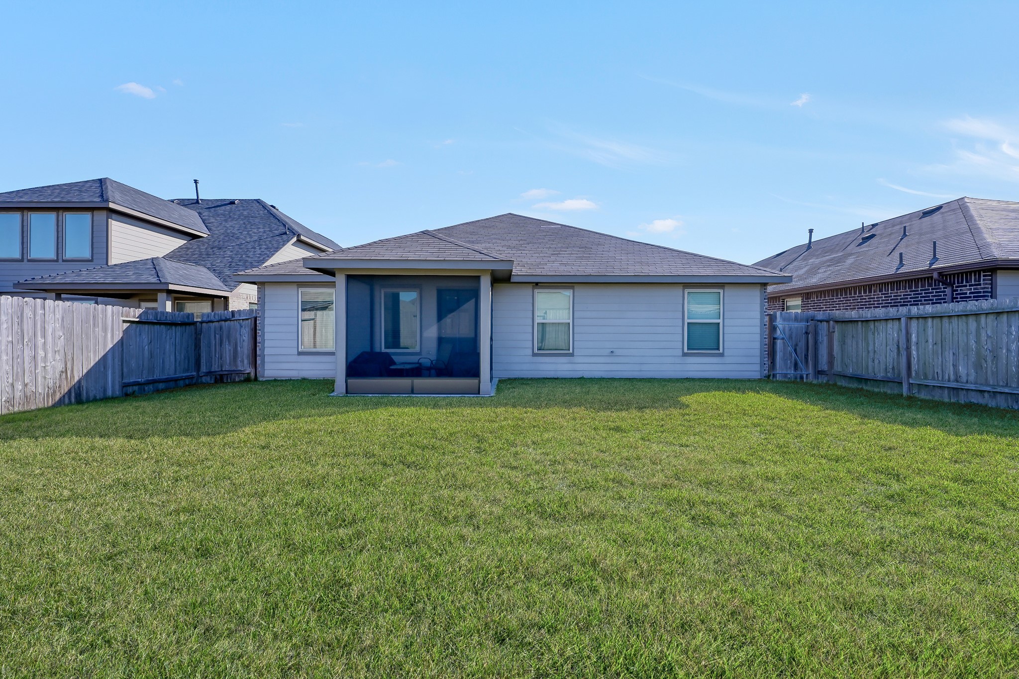 3310 Scout Island Katy, TX 77494 - Photo 37 of 42 a view of brick house with a big yard and large tree