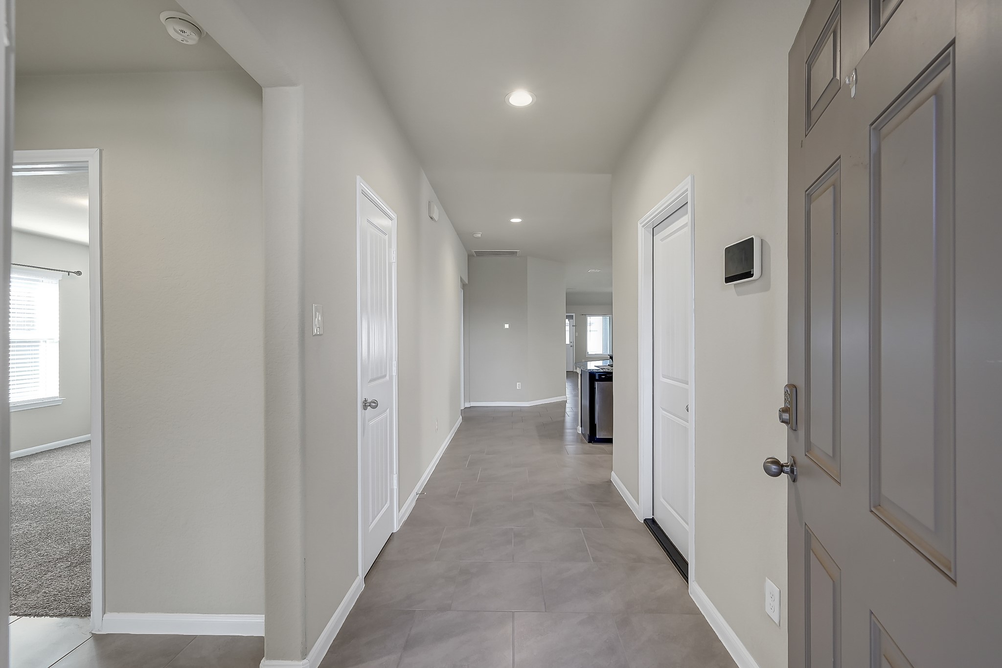 3310 Scout Island Katy, TX 77494 - Photo 5 of 42 a view of a hallway with a room