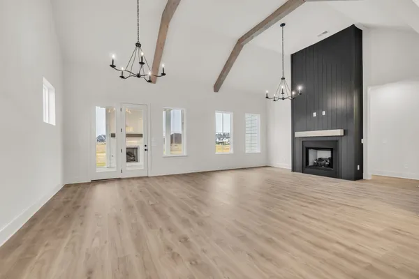 a view of a kitchen with a sink and a kitchen counter top space