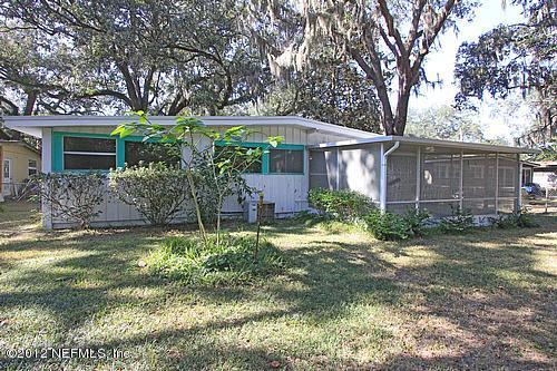 3045 Kline Road Jacksonville, FL 32246 - Photo 14 of 15 front view of a house with a yard