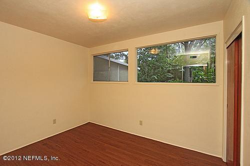 3045 Kline Road Jacksonville, FL 32246 - Photo 10 of 15 an empty room with a window