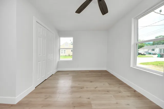 an empty room with windows