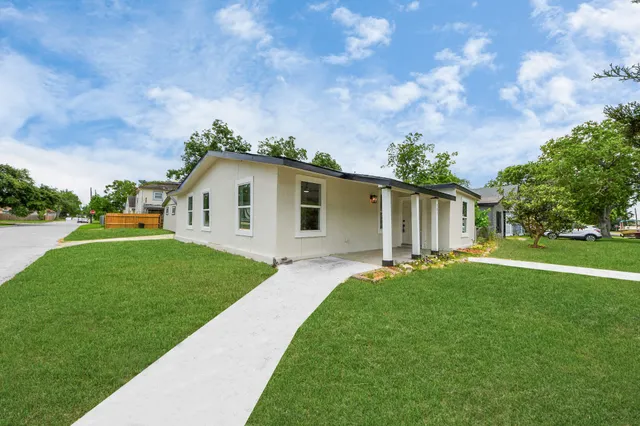 a view of a backyard with a garden