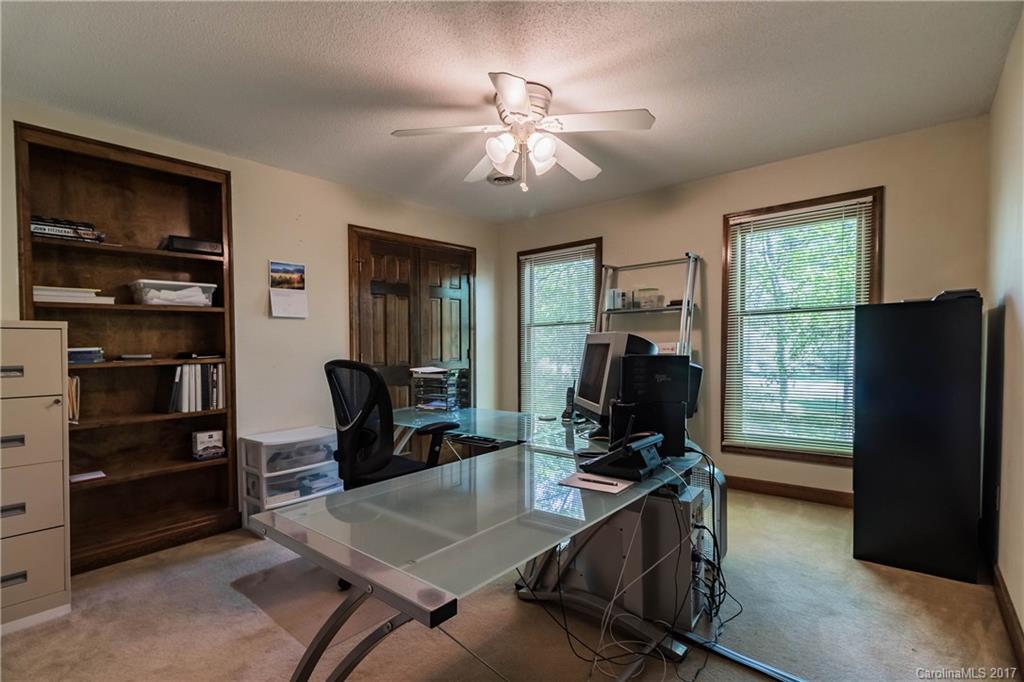 1697 Double Oaks Road Fort Mill, SC 29715 - Photo 16 of 24 a view of a workspace with furniture and a window