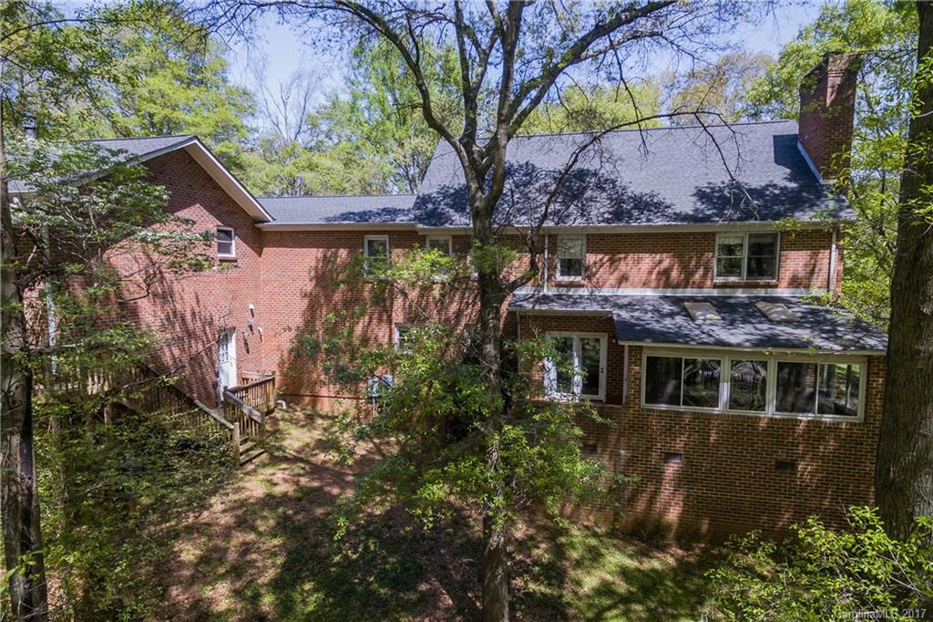 1697 Double Oaks Road Fort Mill, SC 29715 - Photo 3 of 24 a front view of house with a garden