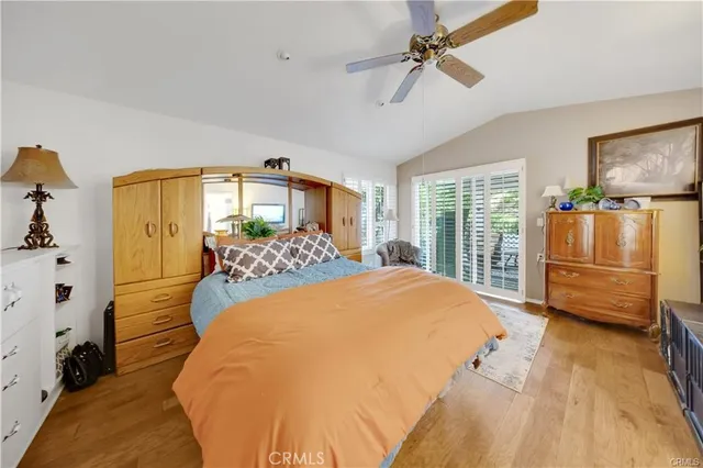 a bed room with a bed and a window