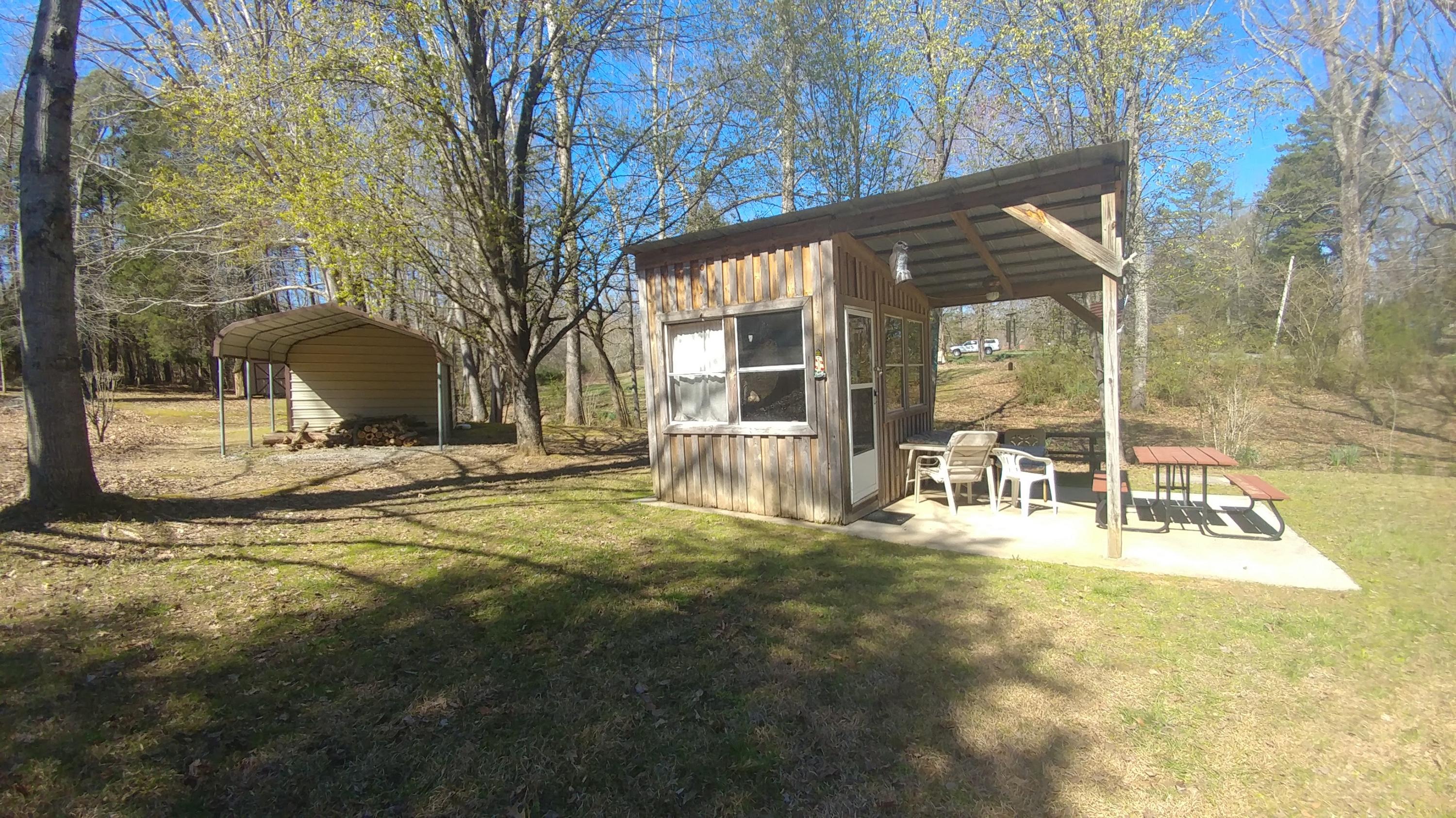 8269 Toestring Valley Road Spring City, TN 37381 - Photo 24 of 36 side view of shed