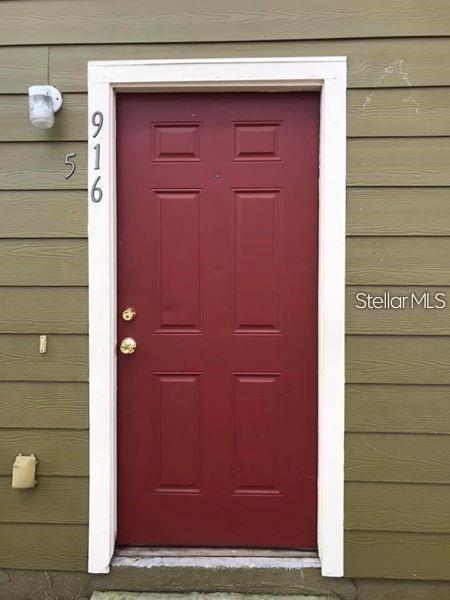 916 Washington Palm Loop, Unit 5 Davenport, FL 33897 - Photo 2 of 6 a view of door