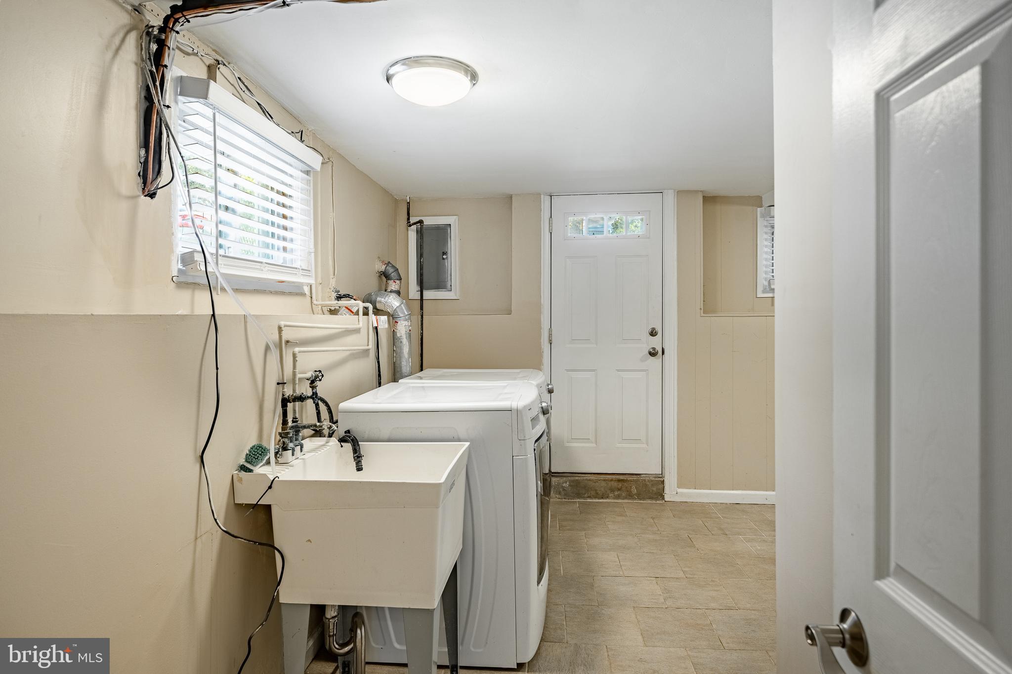 147 Wyndmoor Road Havertown, PA 19083 - Photo 26 of 36 Large Laudry room with outside exit