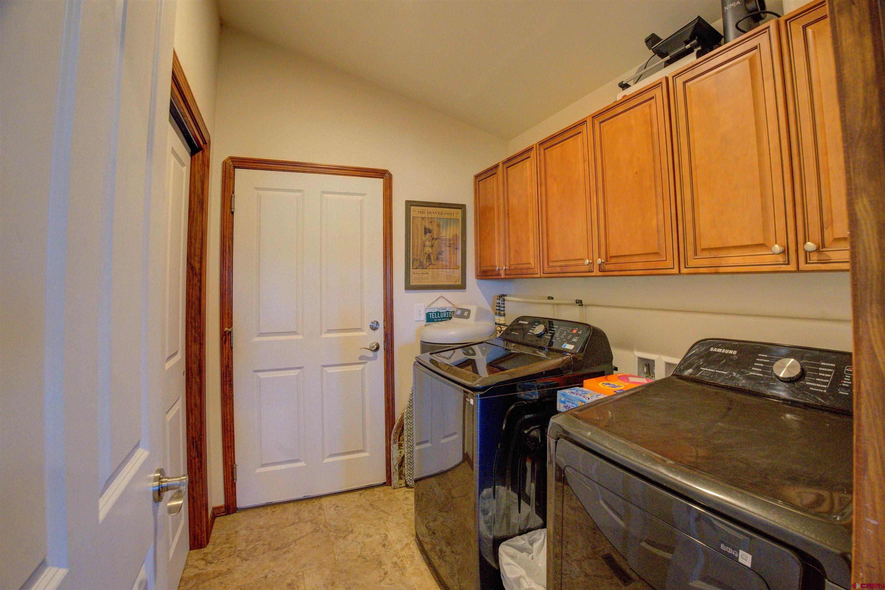 12336 Road 23.25 Loop Cortez, CO 81321 - Photo 25 of 43 a utility room with dryer and washer