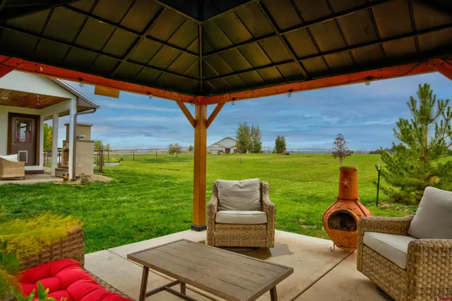 a outdoor living space with furniture and garden view