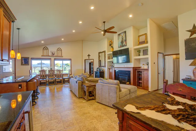a view of kitchen with stainless steel appliances granite countertop stove a sink and dishwasher
