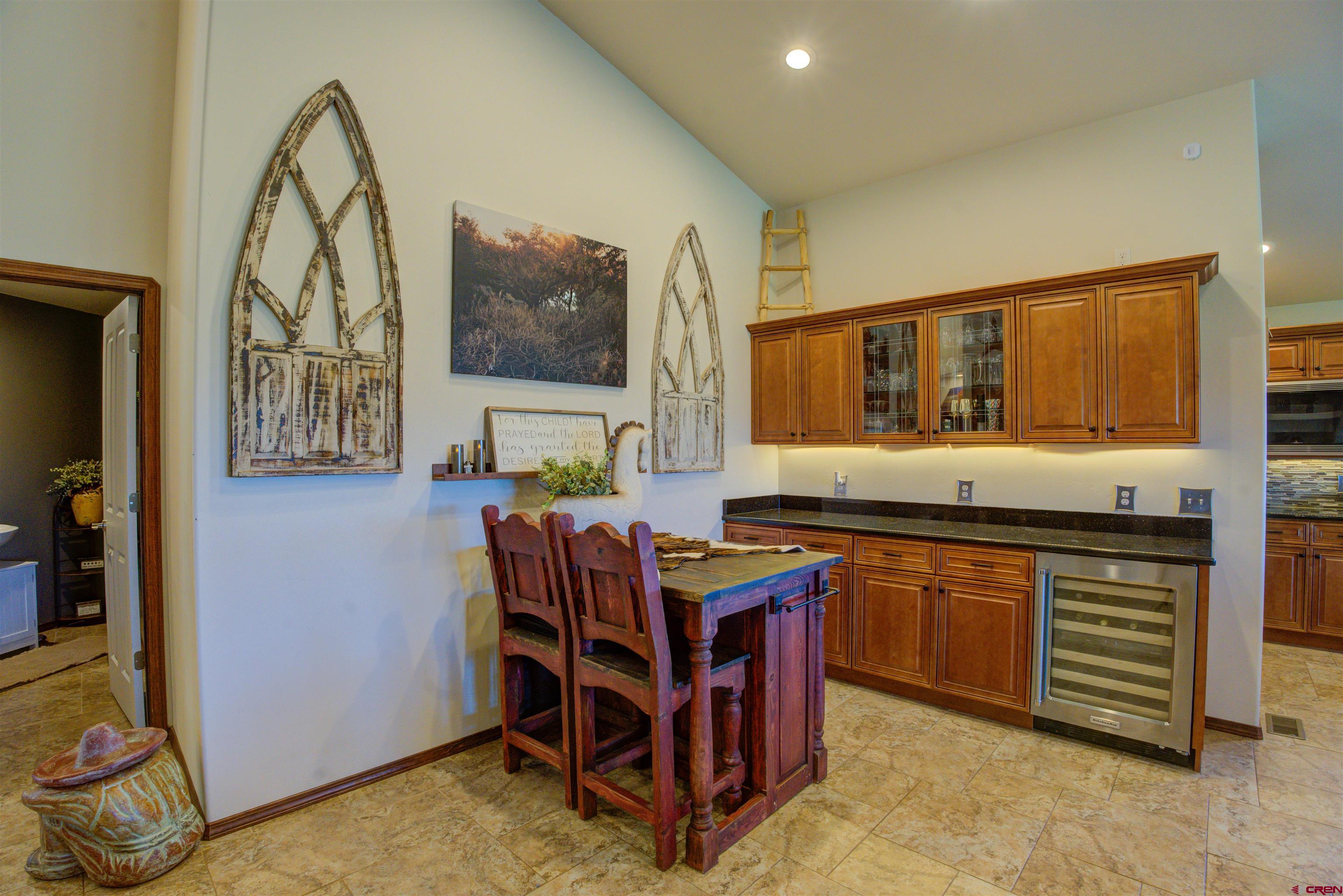 12336 Road 23.25 Loop Cortez, CO 81321 - Photo 10 of 43 a view of kitchen with stainless steel appliances granite countertop stove a sink and dishwasher